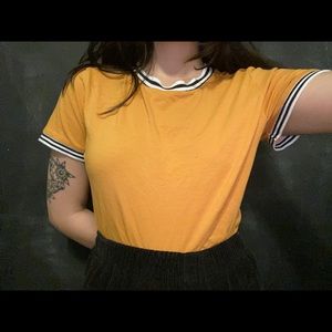 Yellow, stripe bordered shirt